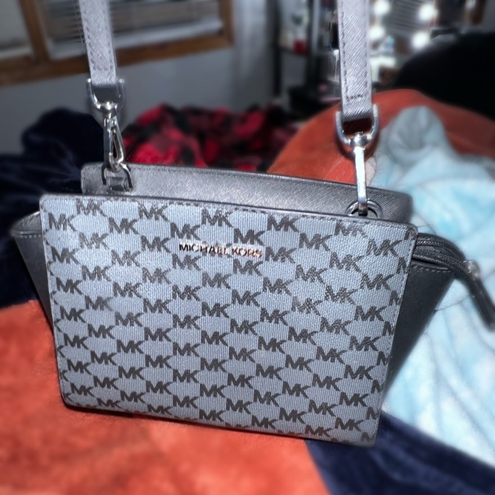 All black MK shoulder bag.